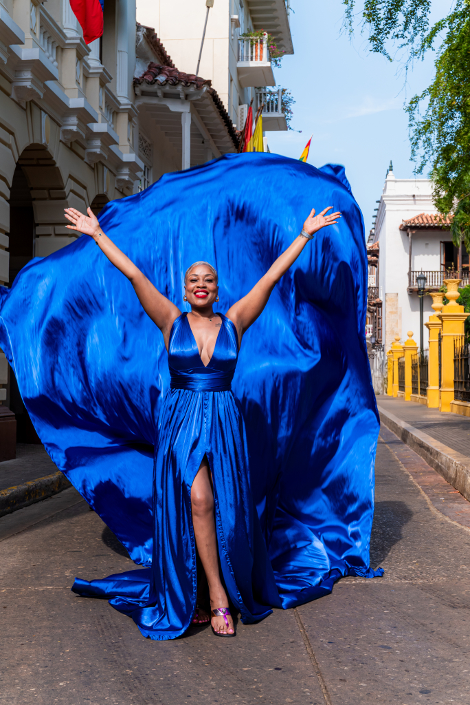 Flying Dress Cartagena photoshoot in Getsemaní Cartagena with colorful street background”