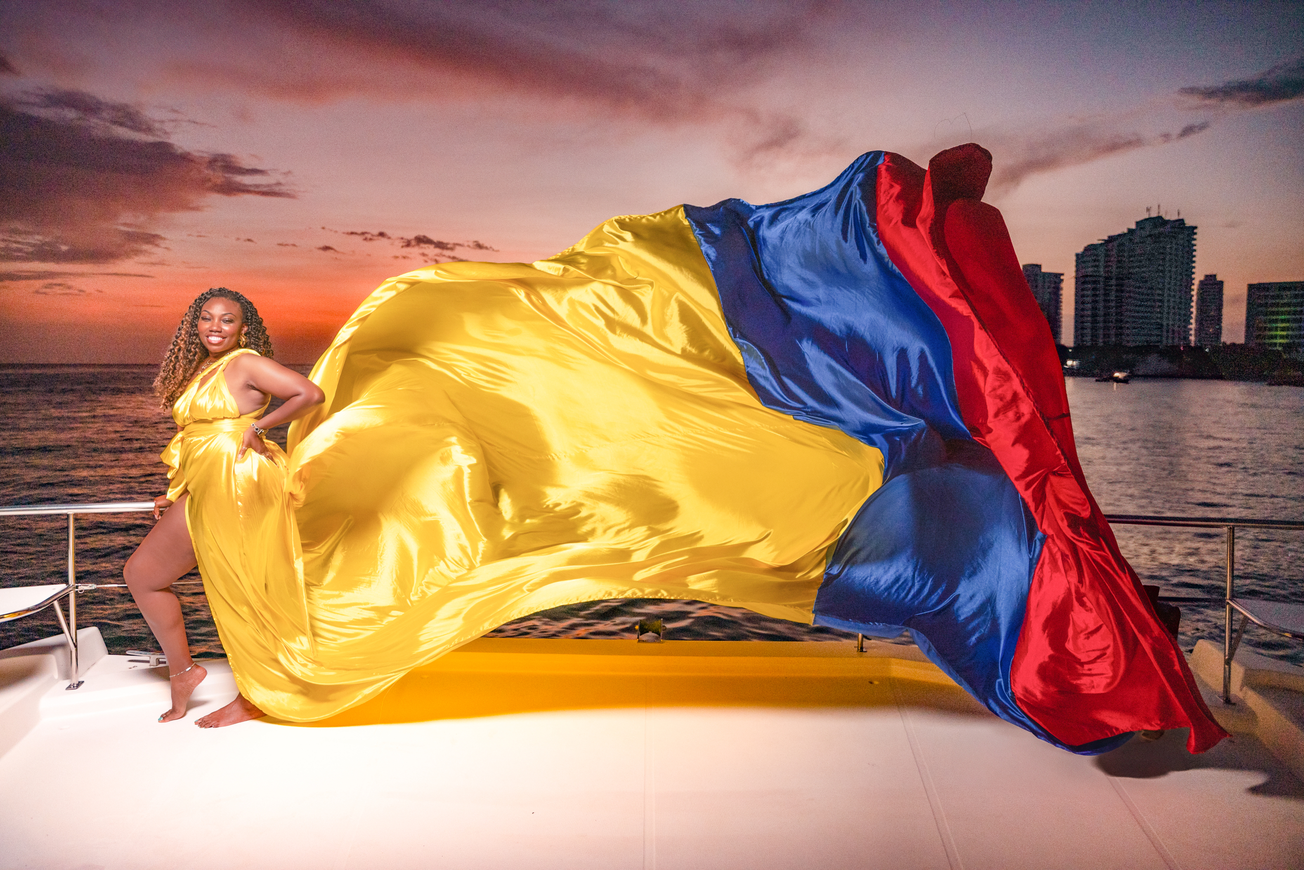 Flying dress session on a sunset yacht in Cartagena